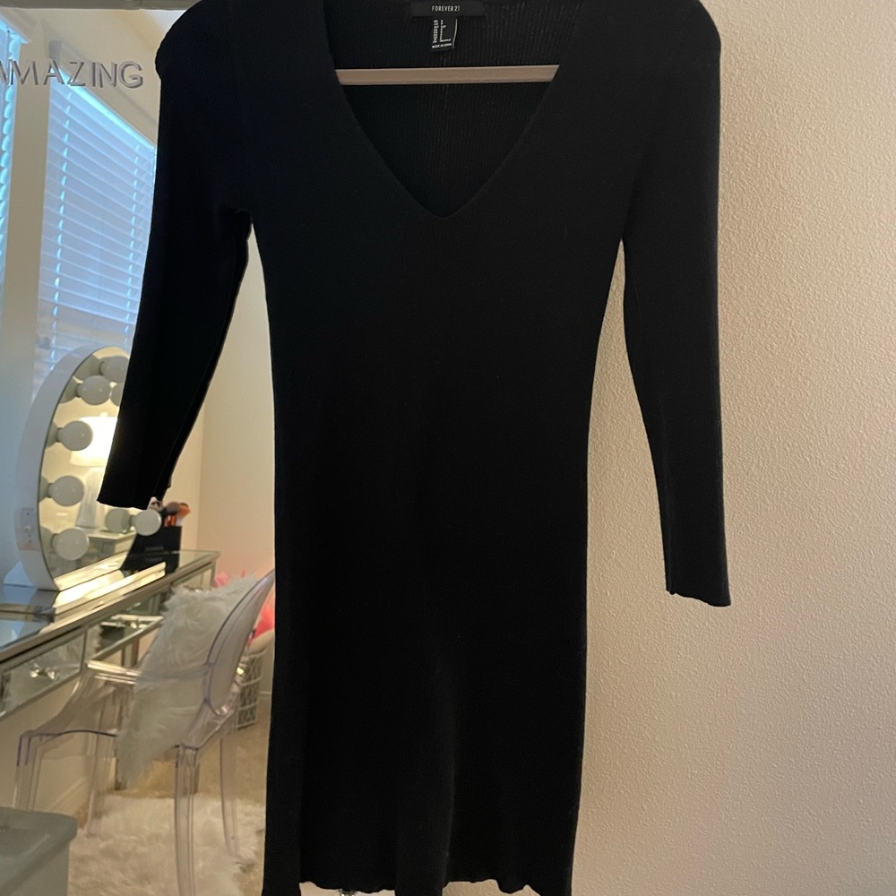MAJOR CLOSET SALE. MORE ITEMS TO COME. Long sleeved black sweater dress - mini